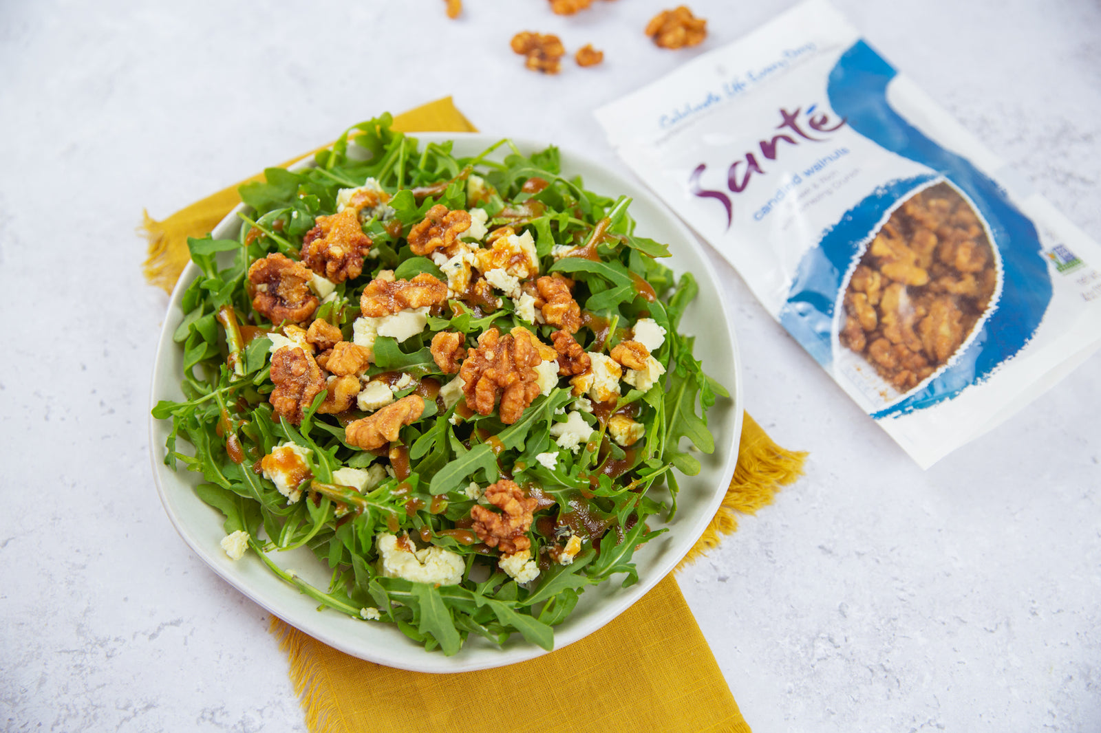 Santé Nuts - Arugula and Walnut Salad with Date Dressing