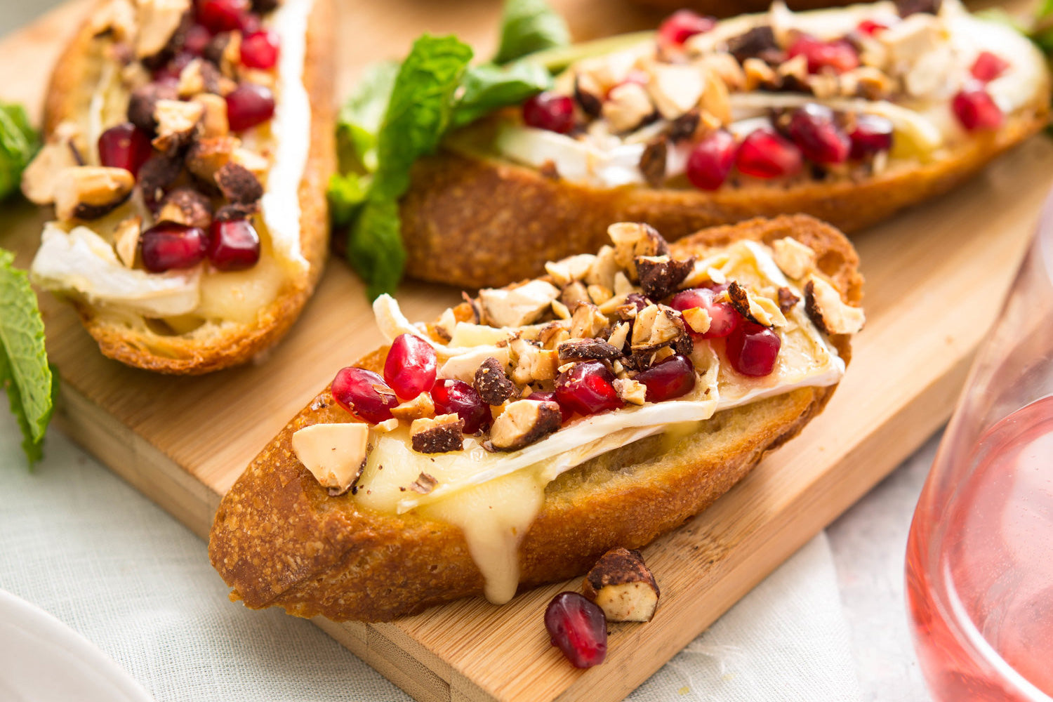 Santé Nuts - Chocolate Almond Brie and Pomegranate Crostini Recipe