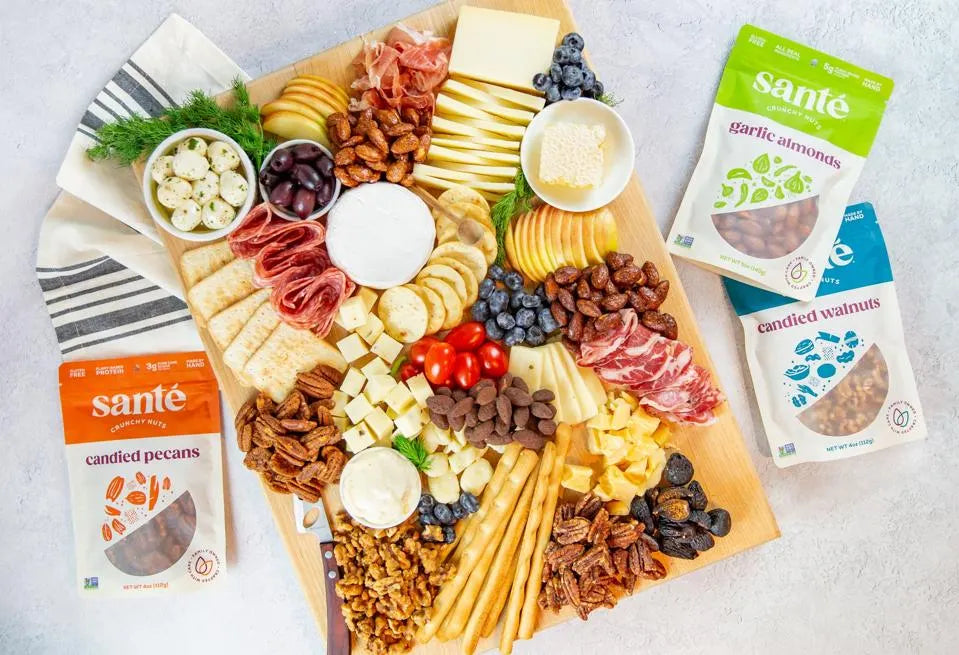 Bags of Santé Nuts with charcuterie board