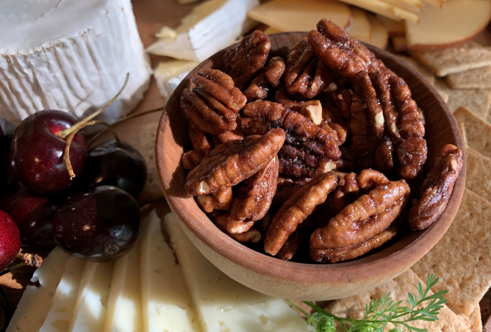 Pecans in a small wooden bowl